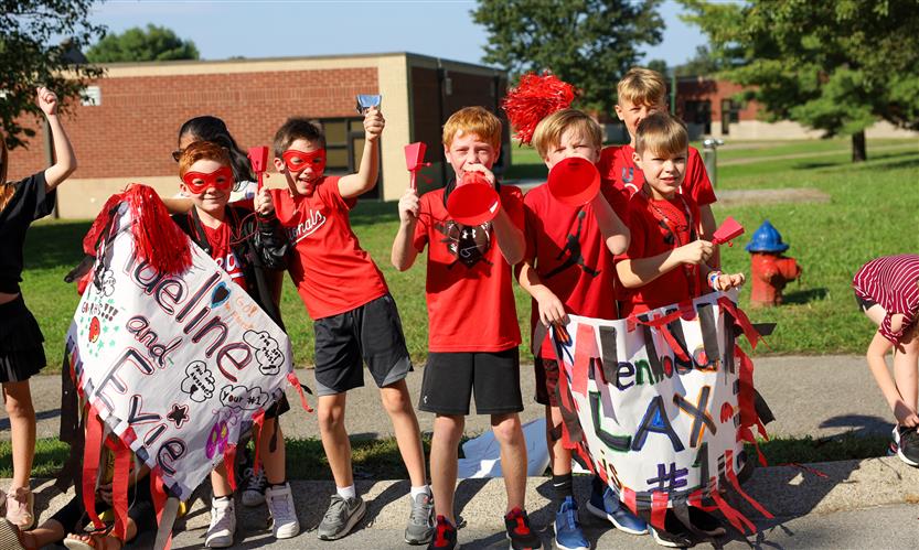 Students participate in homecoming parade